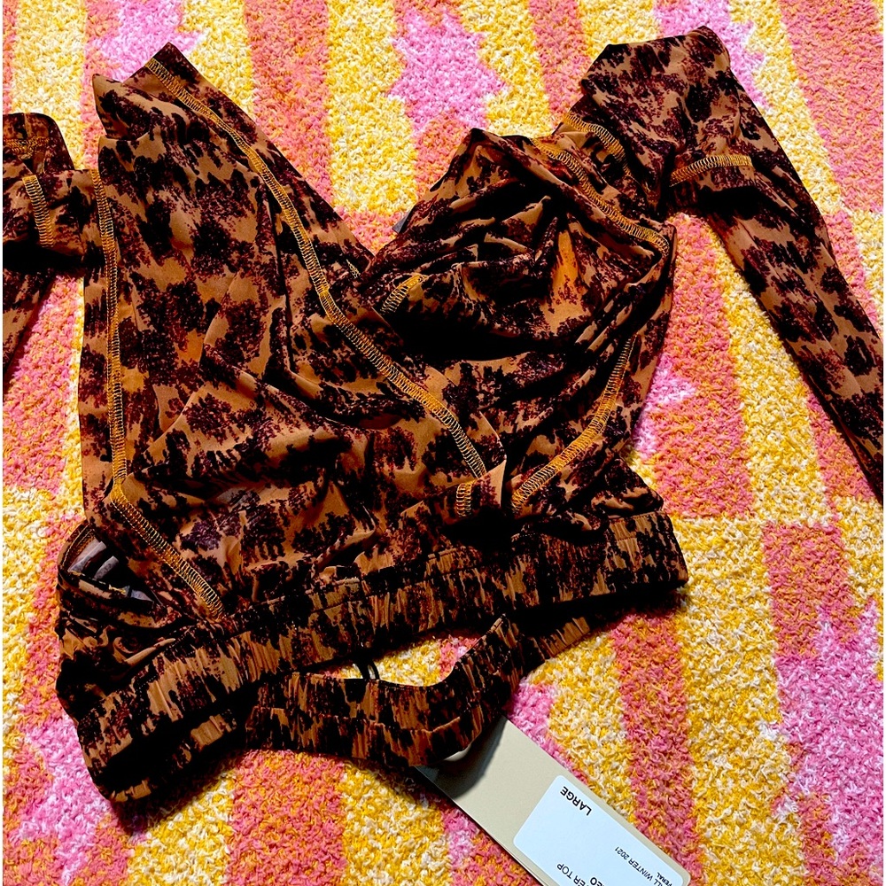 KNWLS Top